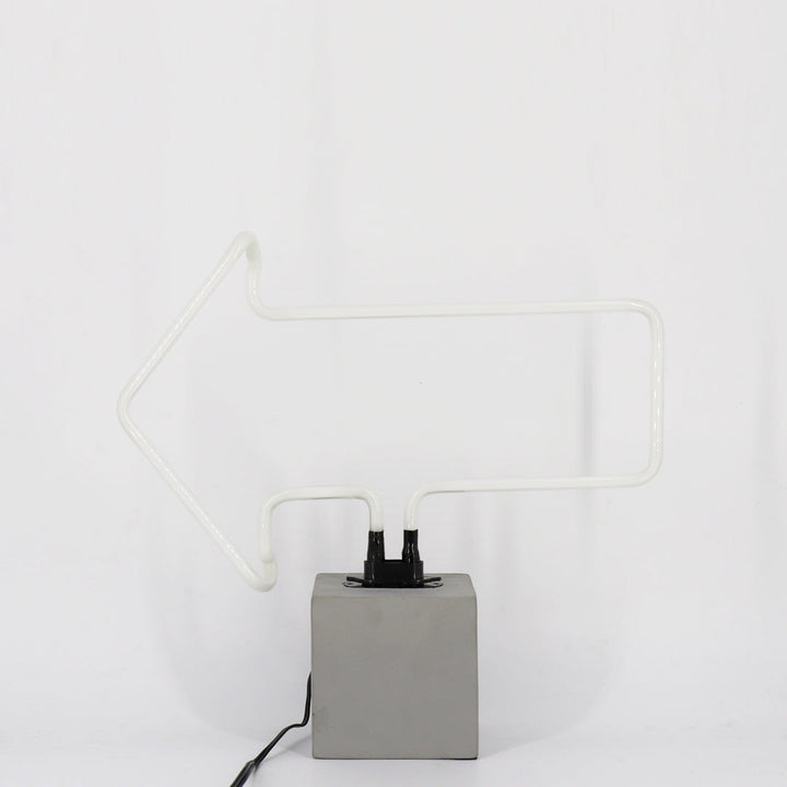 Neon Arrow Sign product image shown in a home or gift setting