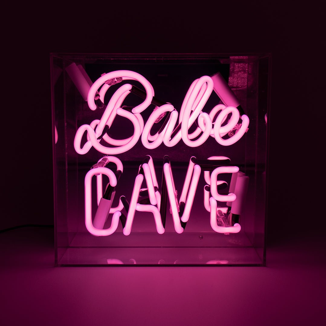 Babe Cave Glass Neon Sign product image shown in a home or gift setting