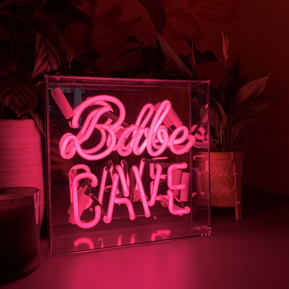 Babe Cave Glass Neon Sign product image shown in a home or gift setting
