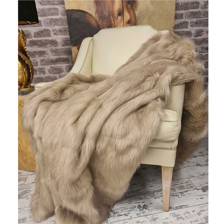 ong-haired camel faux fur throw blanket draped on chair
