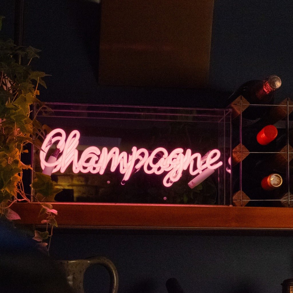 Champagne Glass Neon Sign product image shown in a home or gift setting