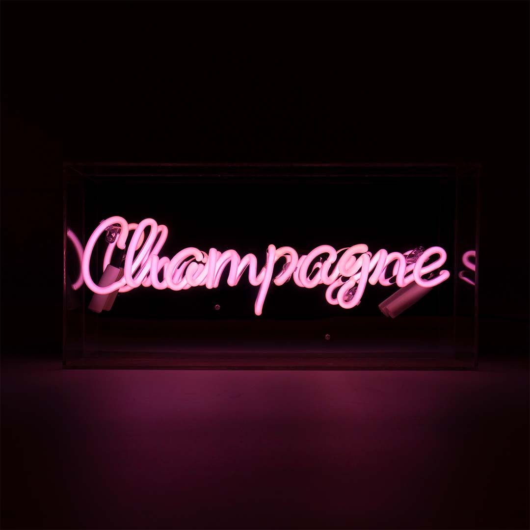 Champagne Glass Neon Sign product image shown in a home or gift setting