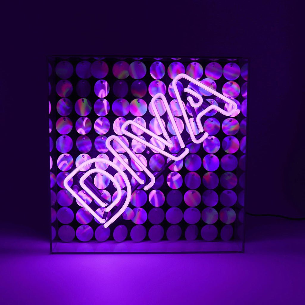 Diva Glass Neon Sign with Sequins product image shown in a home or gift setting