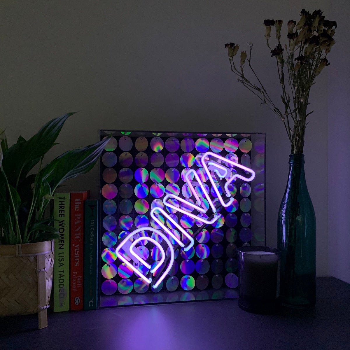 Diva Glass Neon Sign with Sequins product image shown in a home or gift setting