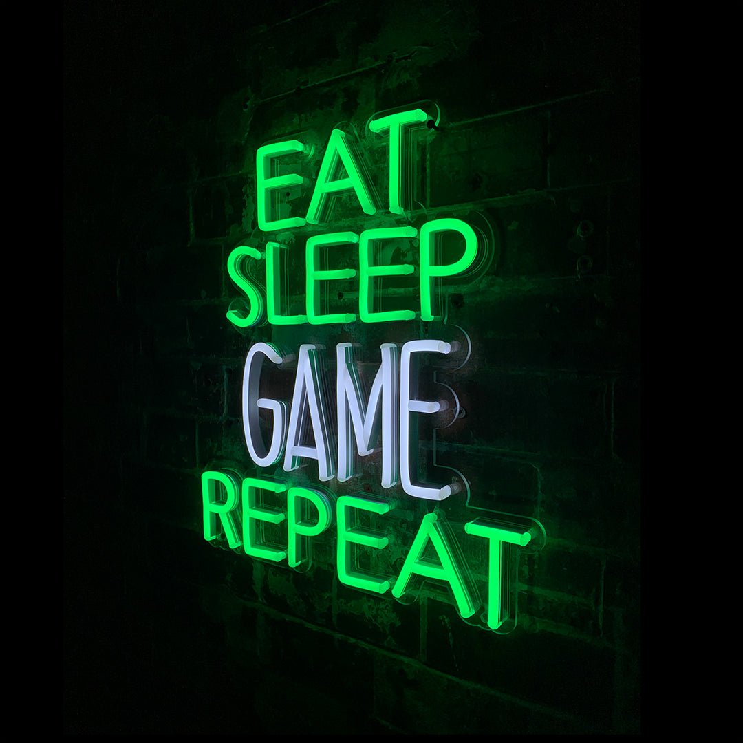 Eat Sleep Game Repeat Green & White Neon LED Wall Mountable Sign product image shown in a home or gift setting