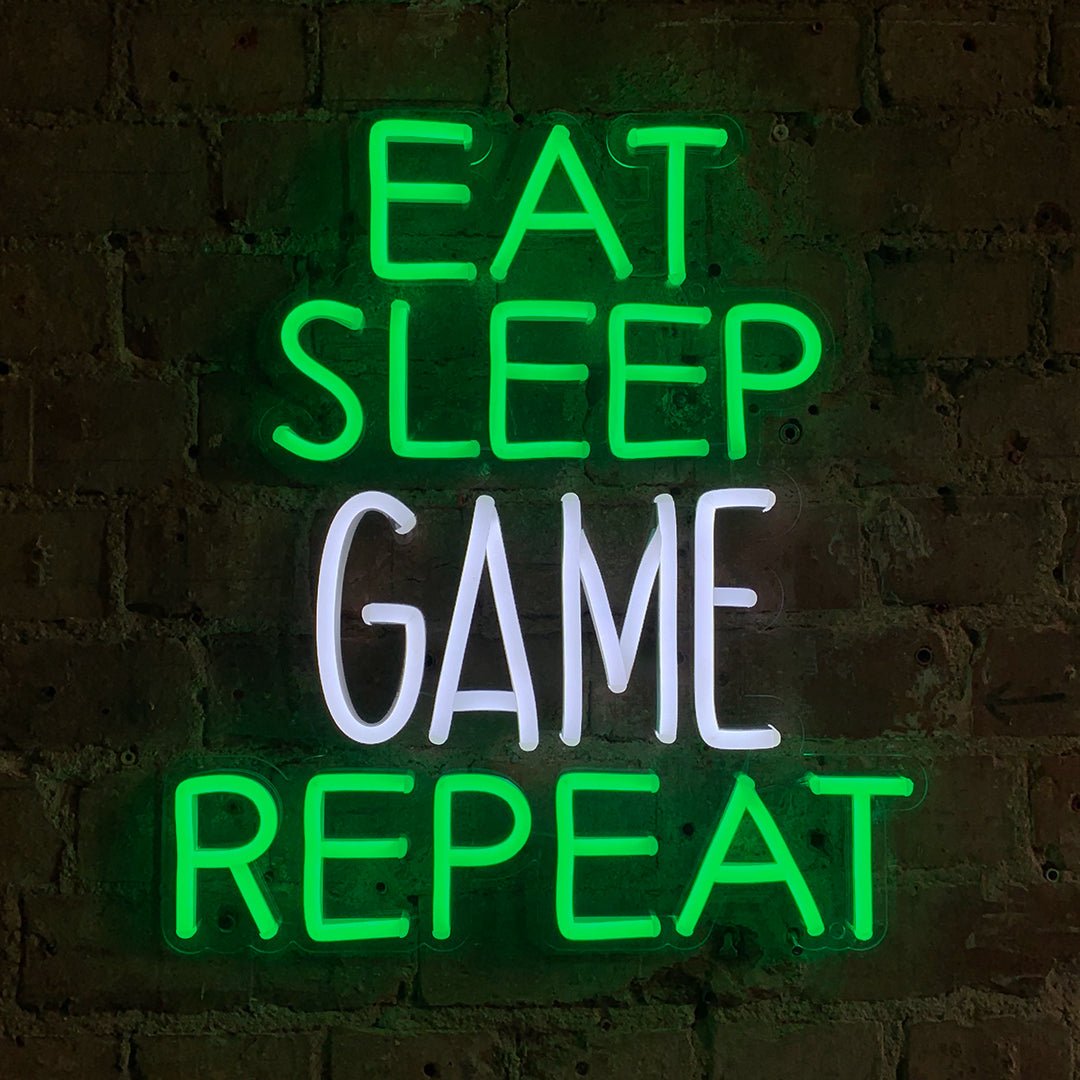 Eat Sleep Game Repeat Green & White Neon LED Wall Mountable Sign product image shown in a home or gift setting