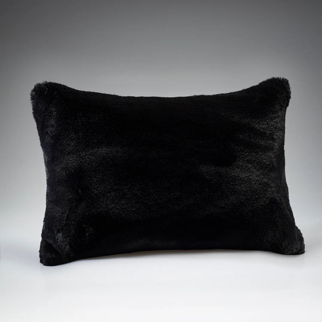 Soft Black rectangular faux fur cushion by Katrina Hampton, shown against a grey background
