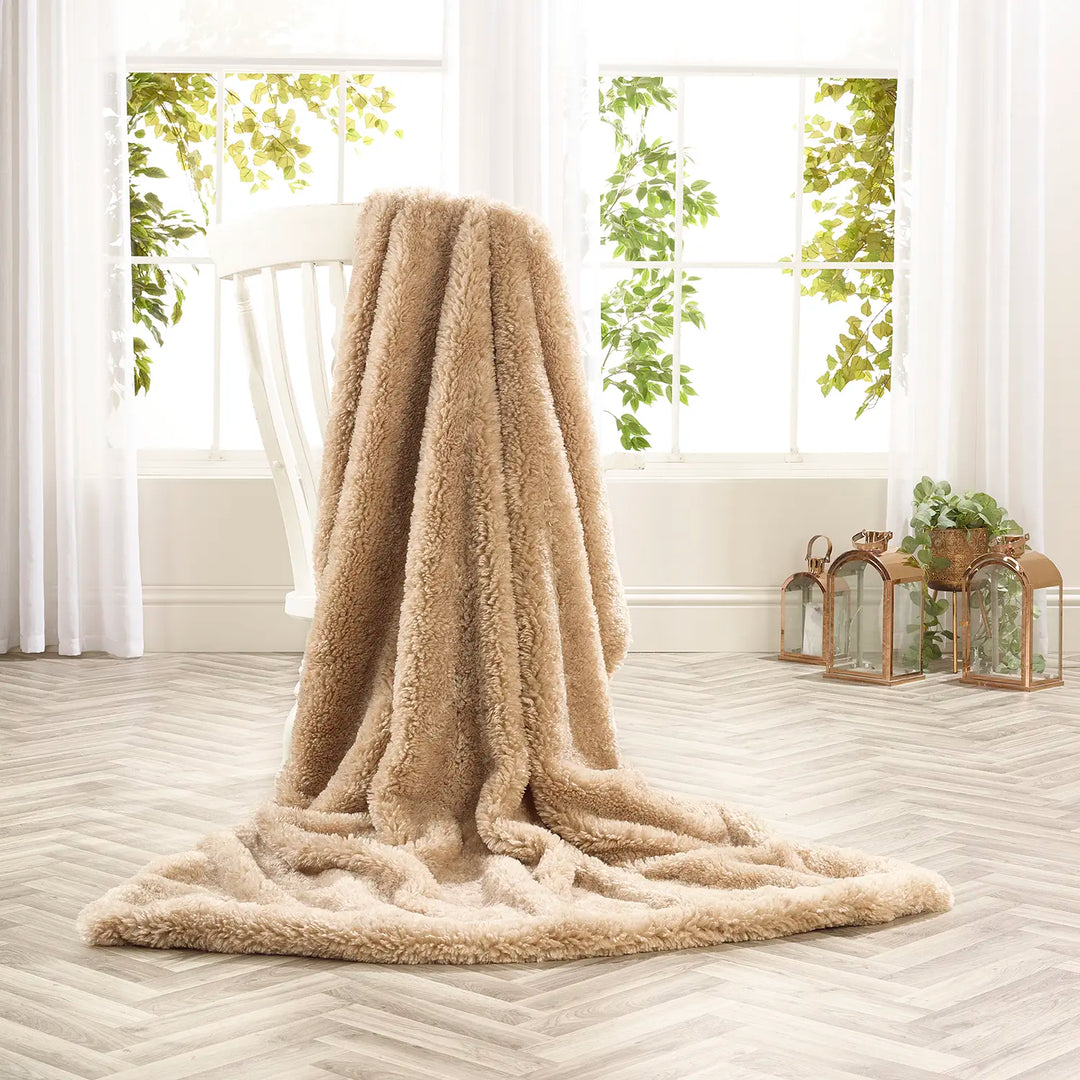 Pebble cream curly faux fur throw