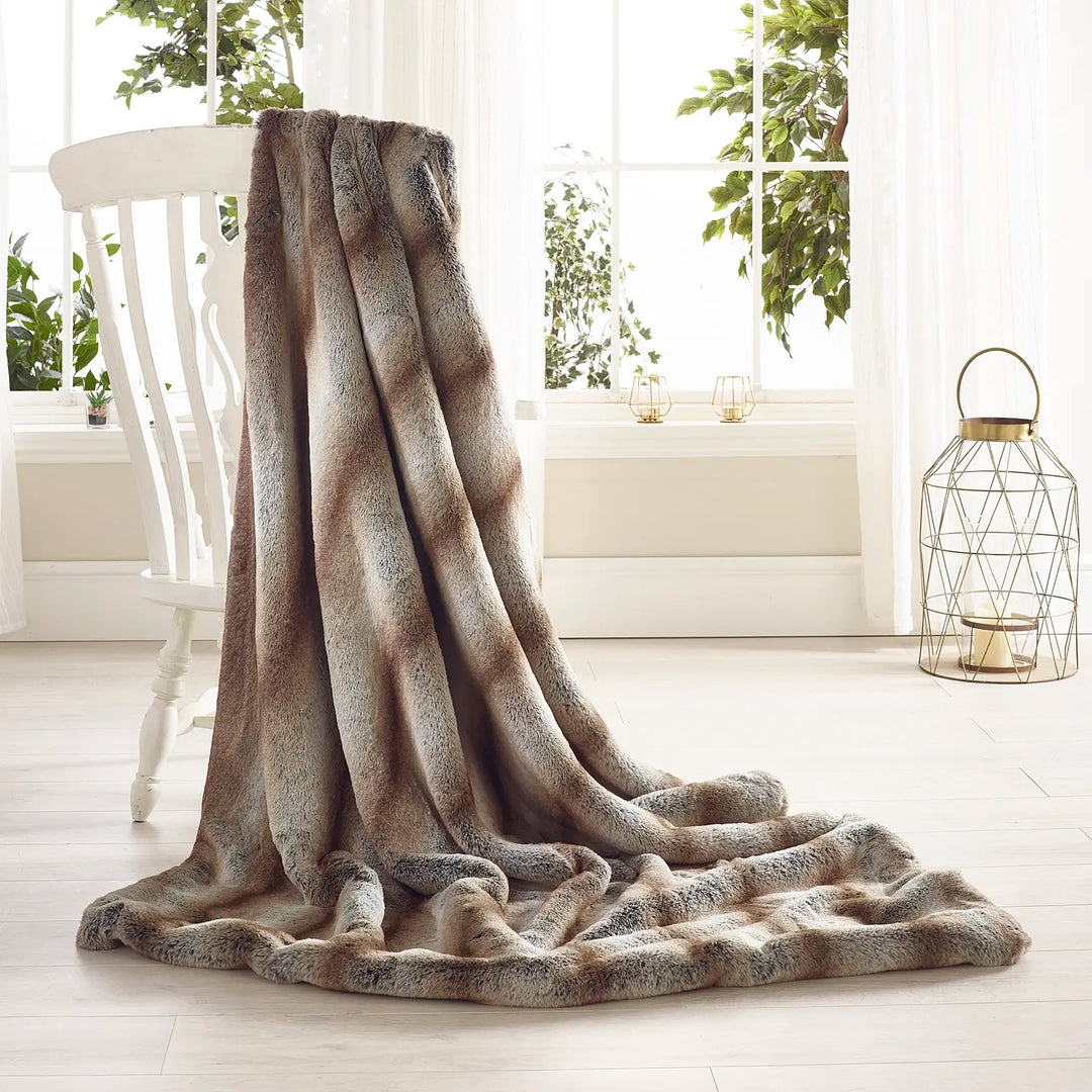 Rabbit Alaska faux fur throw by Katrina Hampton