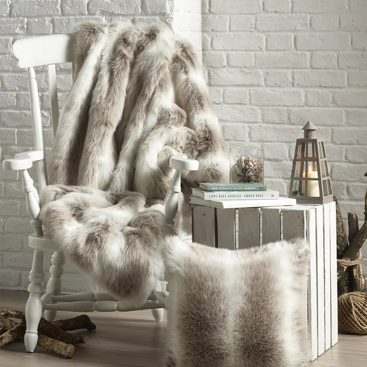 Reindeer faux fur throw by Katrina Hampton