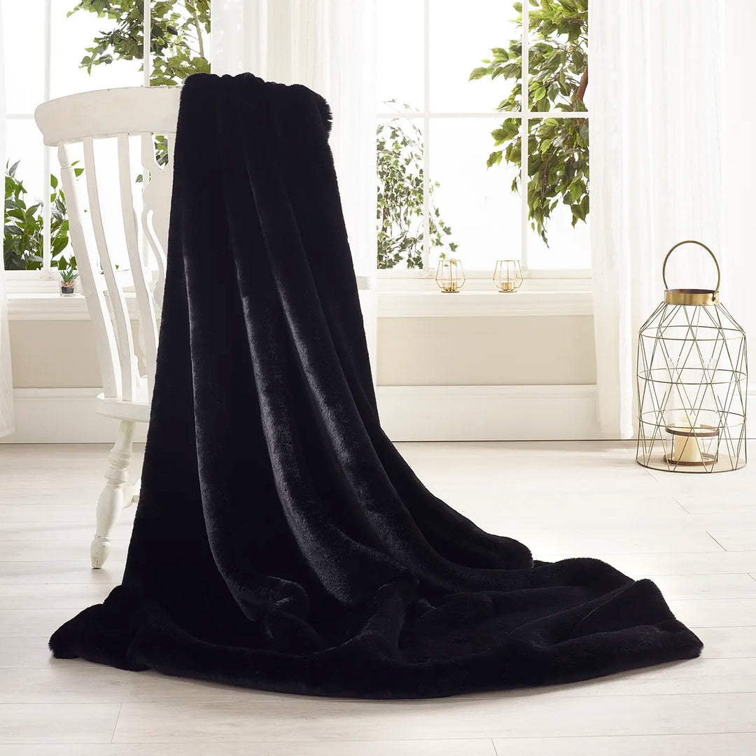 Soft Black faux fur throw by Katrina Hampton