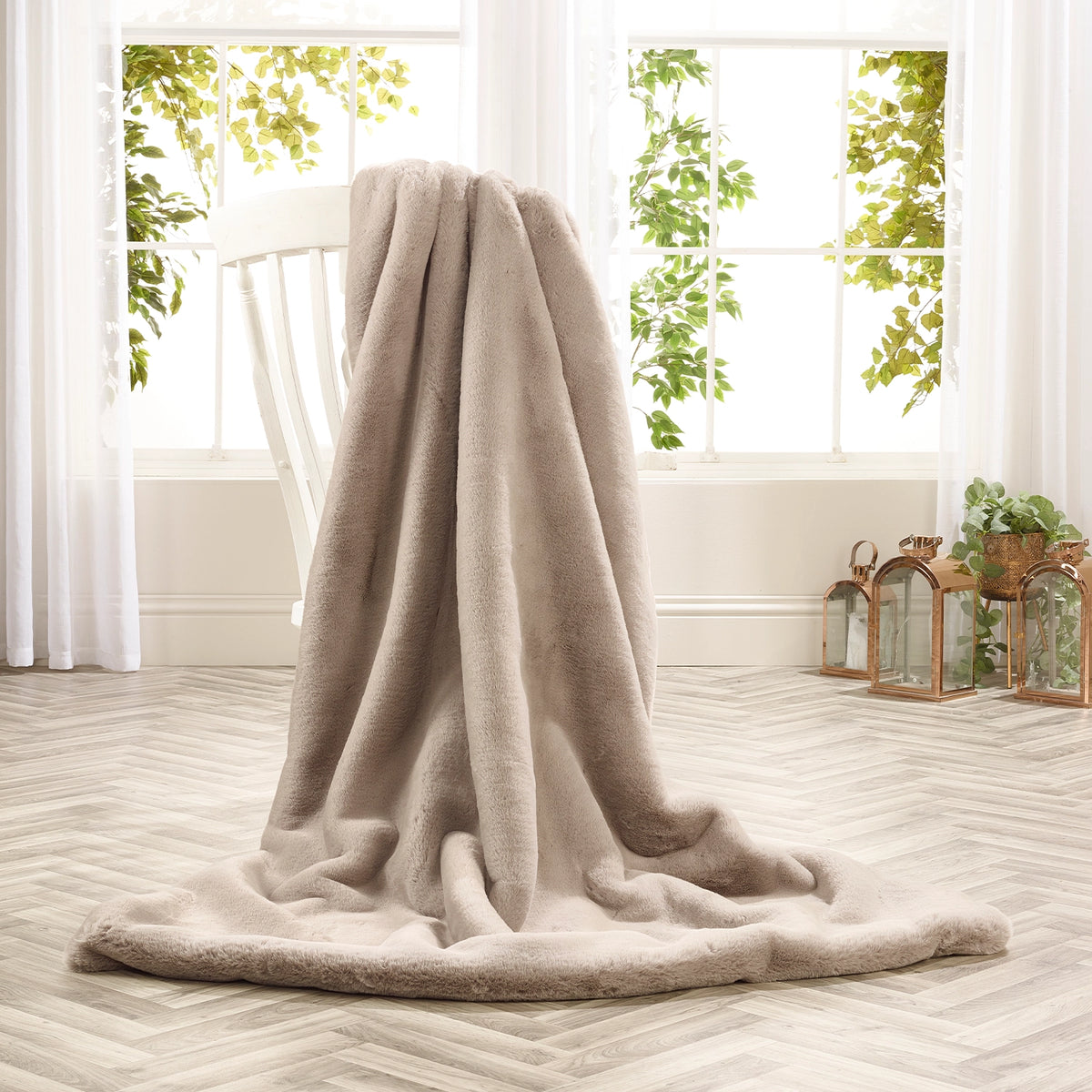 Soft Grey faux fur throw by Katrina Hampton