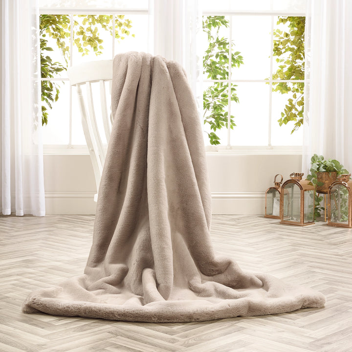 Soft Grey faux fur throw by Katrina Hampton