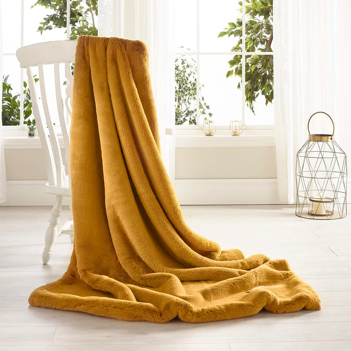 Soft Mustard faux fur throw by Katrina Hampton