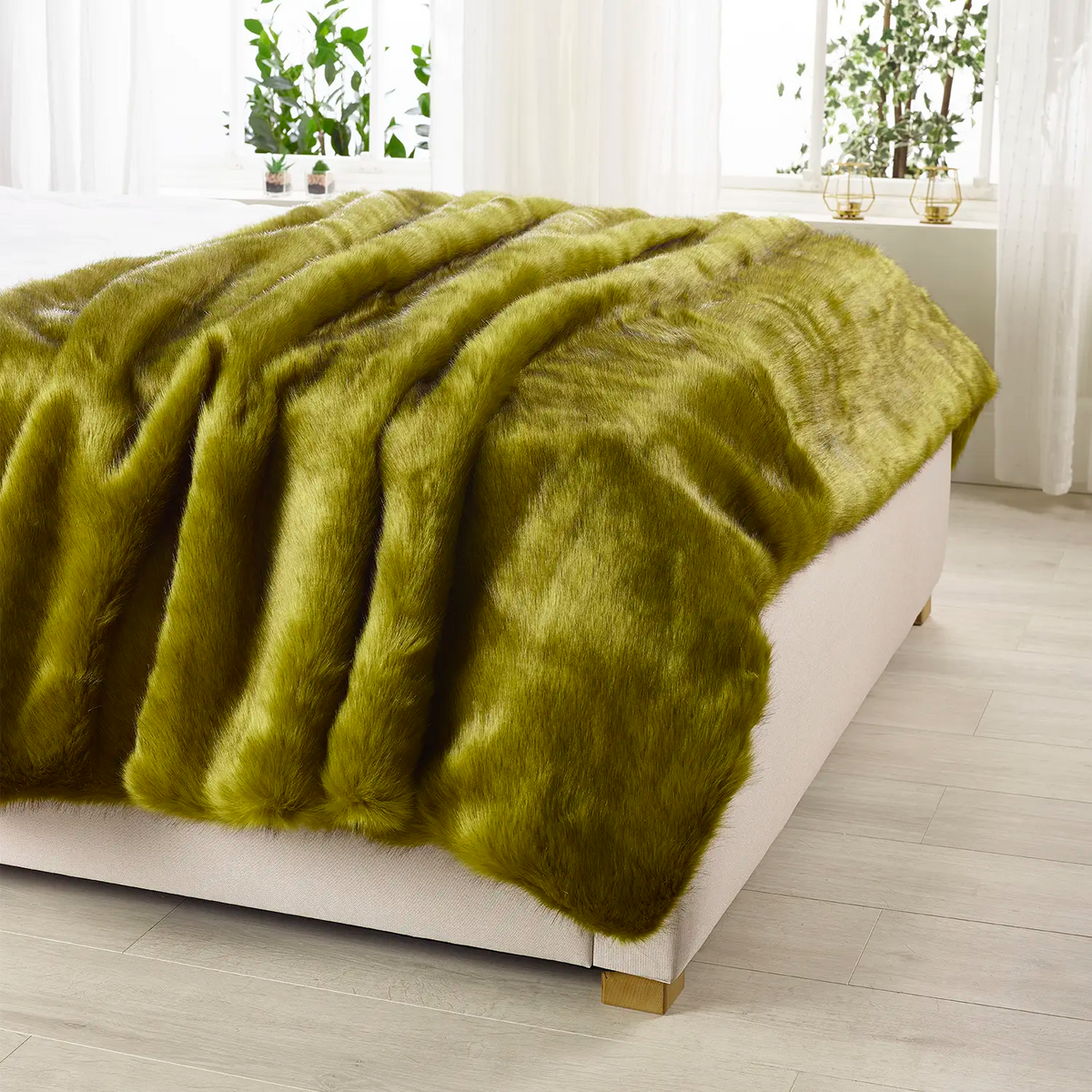 Spinach faux fur throw by Katrina Hampton