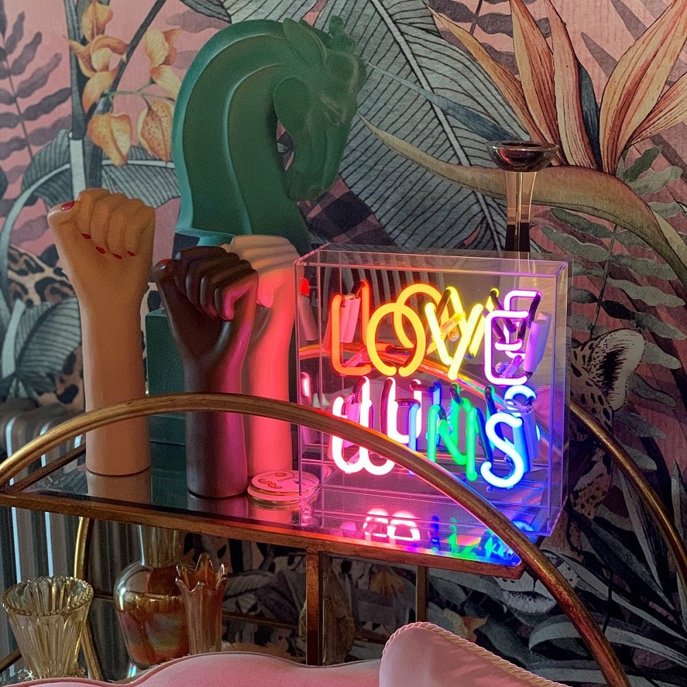 Love Wins Glass Neon Sign product image shown in a home or gift setting