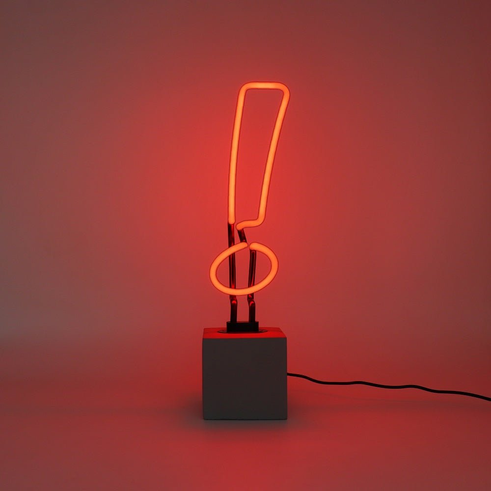Neon Exclamation Mark Sign product image shown in a home or gift setting