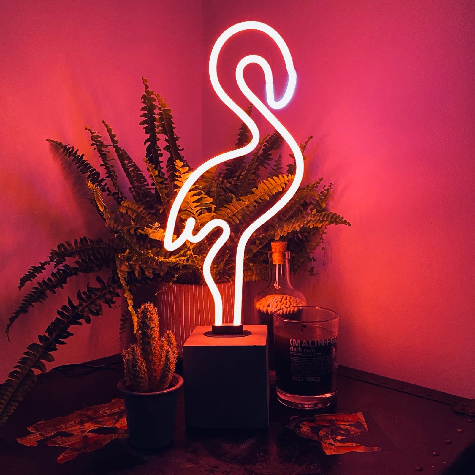Neon Flamingo Sign product image shown in a home or gift setting