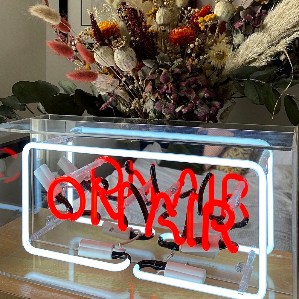 On Air Glass Neon Sign product image shown in a home or gift setting