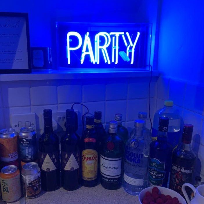 Party Glass Neon Sign   Blue product image shown in a home or gift setting