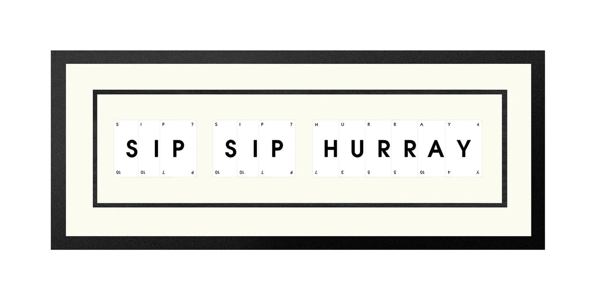 Handmade playing card picture frame spelling 'Sip Sip Hurray' – framed quote wall art made in the UK.
