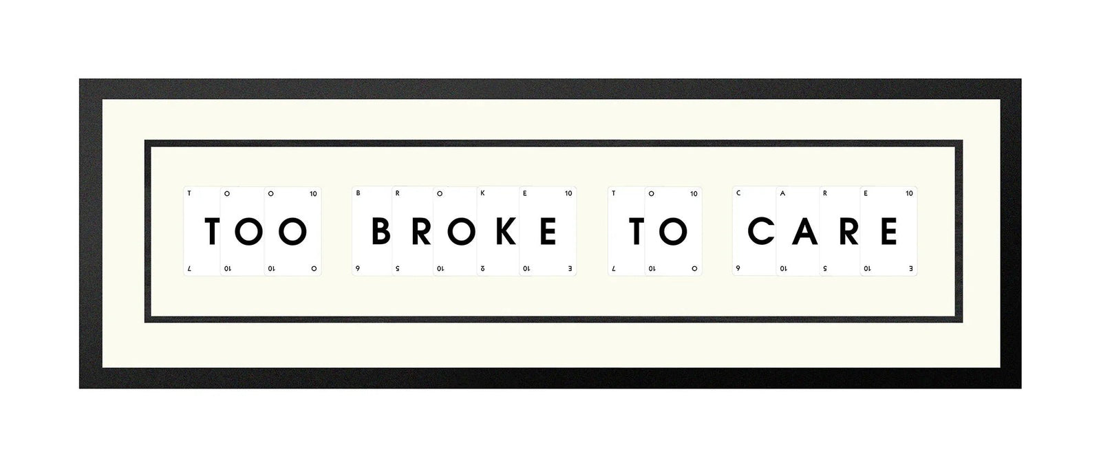 Handmade playing card picture frame spelling 'Too Broke To Care' – framed quote wall art made in the UK.