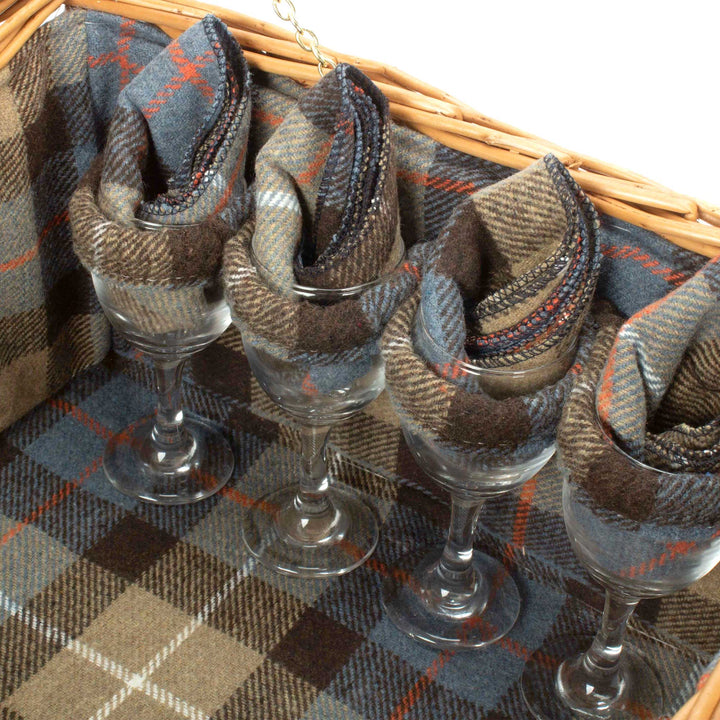 Deluxe 4 Person Ravenstor fully fitted picnic hamper with beige and blue tartan lining showing wine glasses and napkins