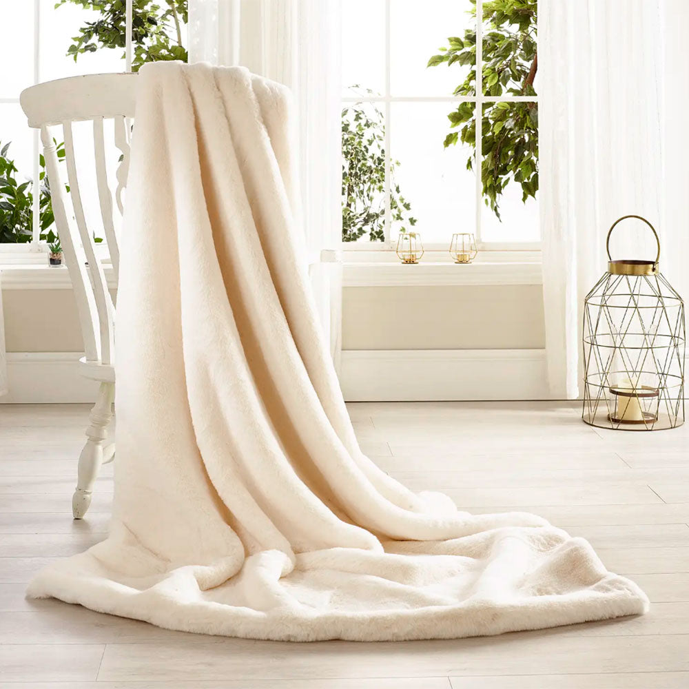 Faux Fur Throw in Soft Cream In Two Sizes by Katrina Hampton