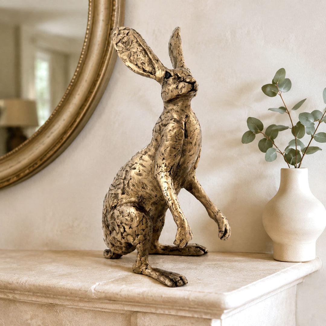 Thomas the Dorset Hare bronze sculpture displayed on a stylish mantelpiece