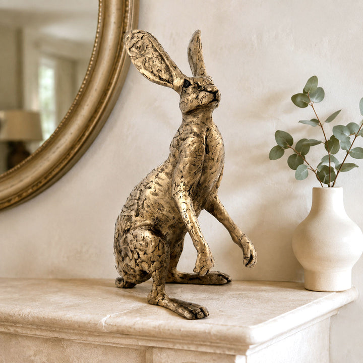 Thomas the Dorset Hare bronze sculpture displayed on a stylish mantelpiece