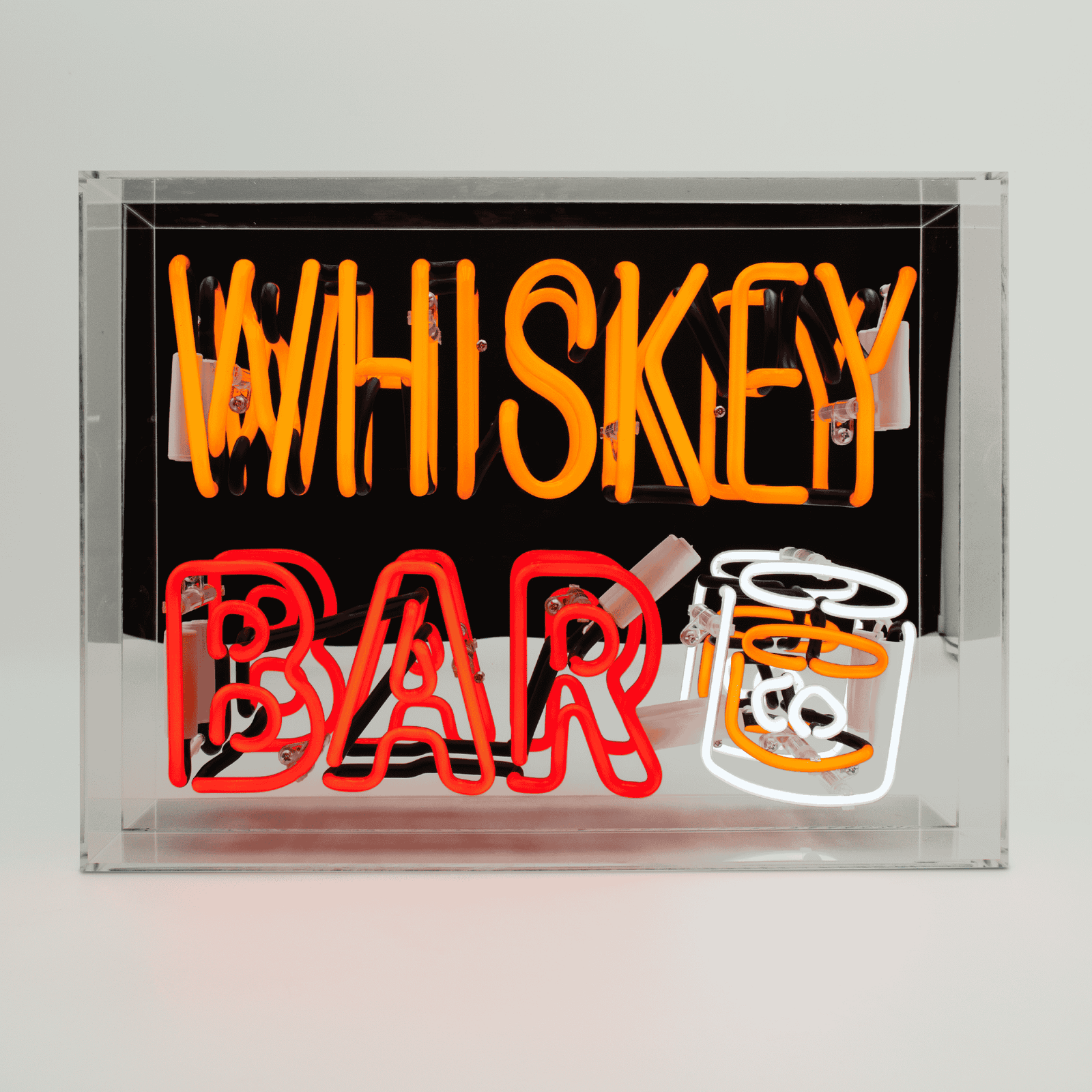 Whiskey Bar Glass neon Sign product image shown in a home or gift setting