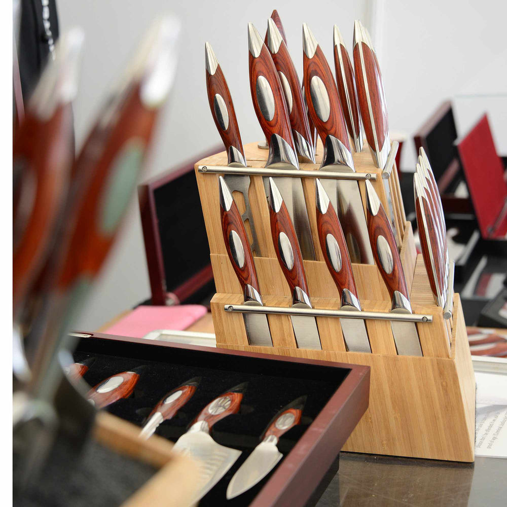 Flint and Flame professional chef twenty piece (20) knife set in a detachable two piece wooden block shown in a lifestyle setting