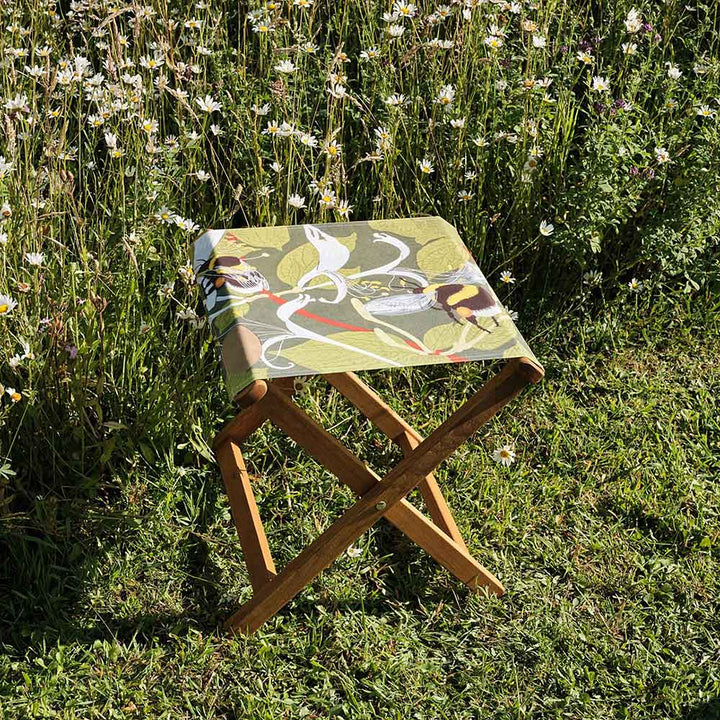 ARTWORLD STOOLS Bumblebees in Green -  Hardwood Folding Stool lifestyle